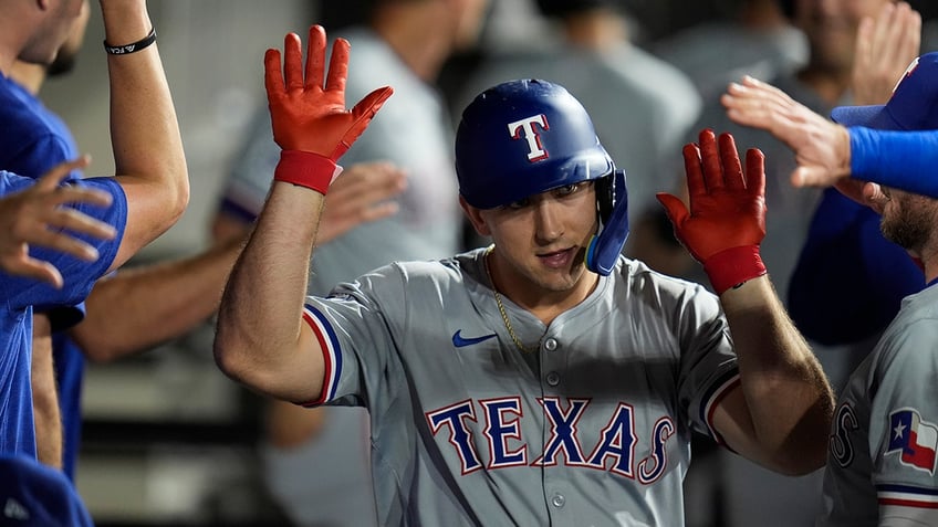 Wyatt Langford celebrates a home run