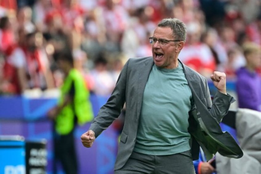 Austria's head coach Ralf Rangnick celebrates his team's win over Poland in Berlin