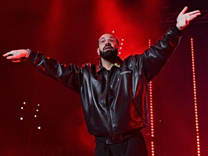 ATLANTA, GA - DECEMBER 9: Rapper Drake performs onstage during "Lil Baby & Friends Birthday Celebration Concert" at State Farm Arena on December 9, 2022 in Atlanta, Georgia. (Photo by Prince Williams/Wireimage)