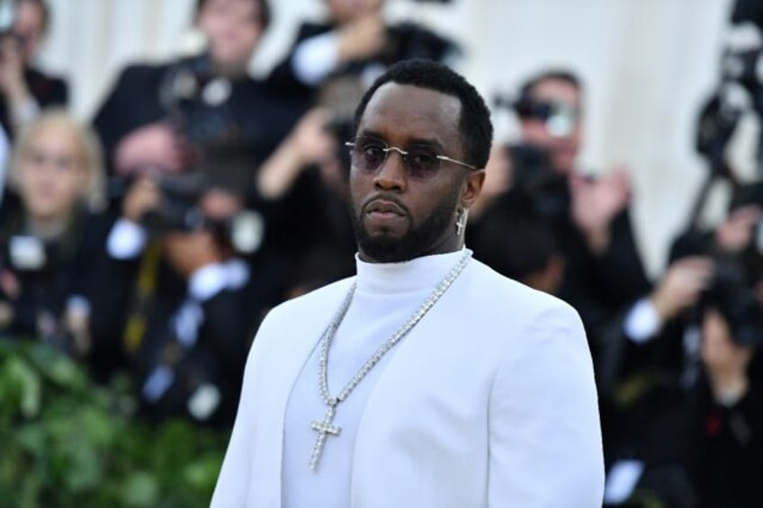 rap mogul sean combs sued for rape by singer cassie