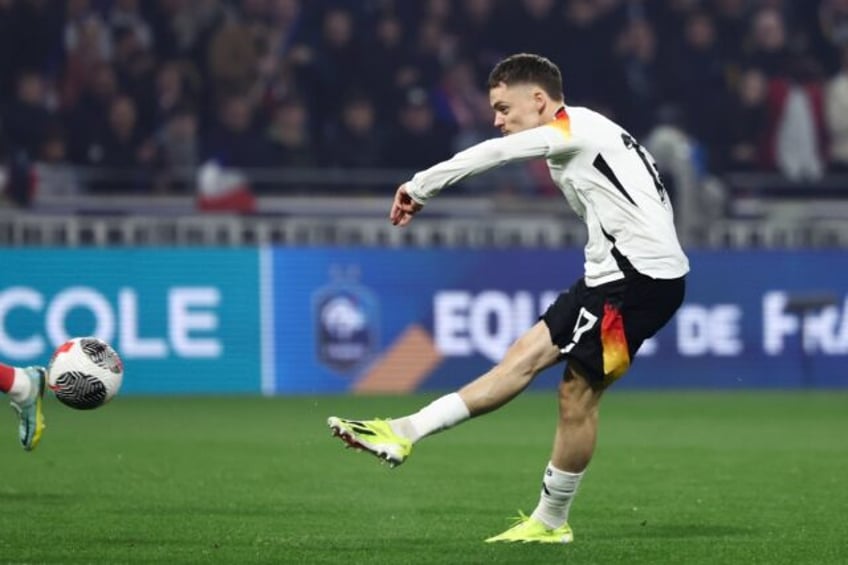 Florian Wirtz shoots to open the scoring for Germany against France with just seven second