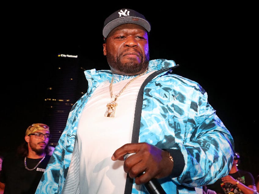 rapper 50 cent angrily hurls microphone into crowd fan hit in the head and hospitalized