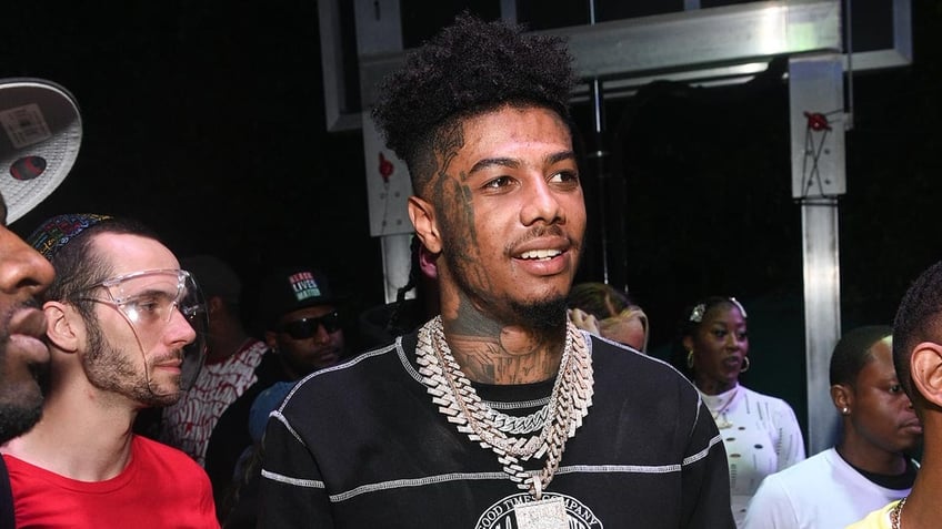 rapper blueface turns private suite at rams game into personal strip club then proposes to girlfriend