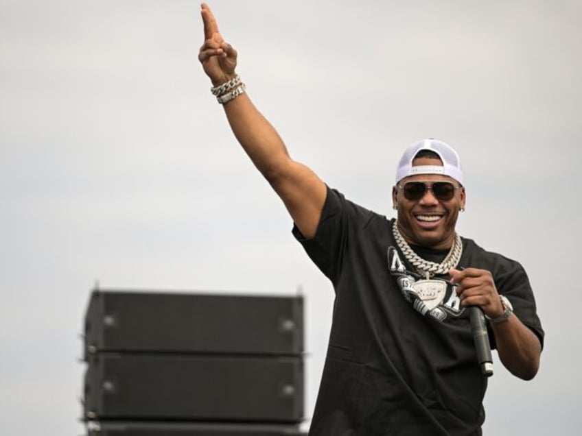 FILE - Rapper Nelly performs prior to a NASCAR Cup Series auto race at Charlotte Motor Spe