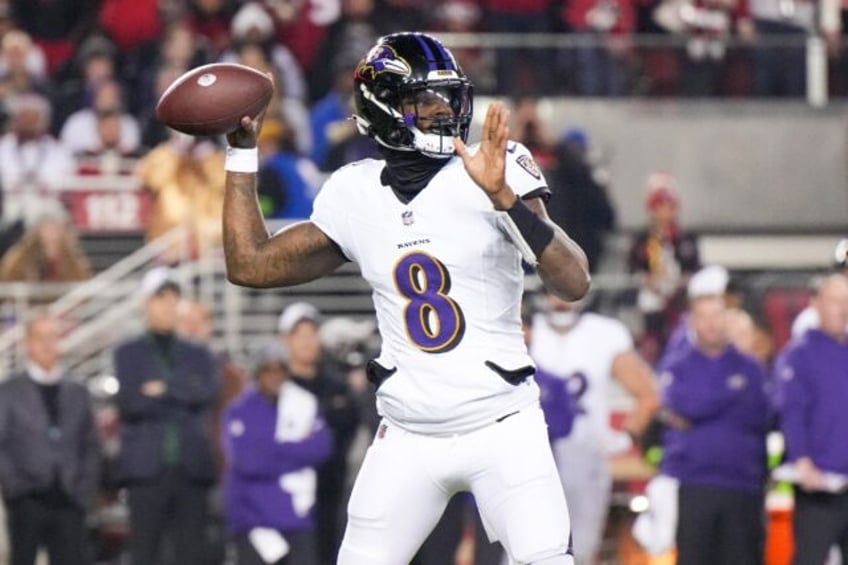 Baltimore Ravens' quarterback Lamar Jackson can guide his team to the top seed in the AFC with victory over the Miami Dolphins on Sunday