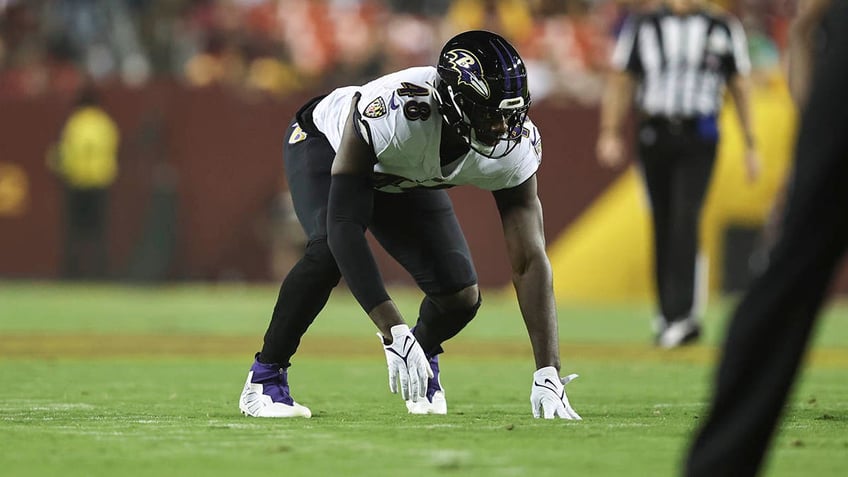 Jeremiah Moon plays during a Ravens game