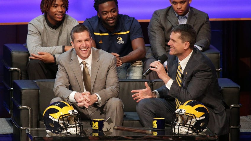 John and Jim Harbaugh attend an event