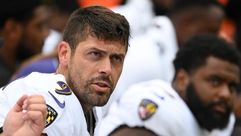 Justin Tucker on the sideline