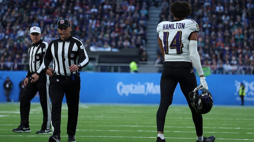 ravens kyle hamilton ejected for brutal hit on titans wide receiver f ing bulls 