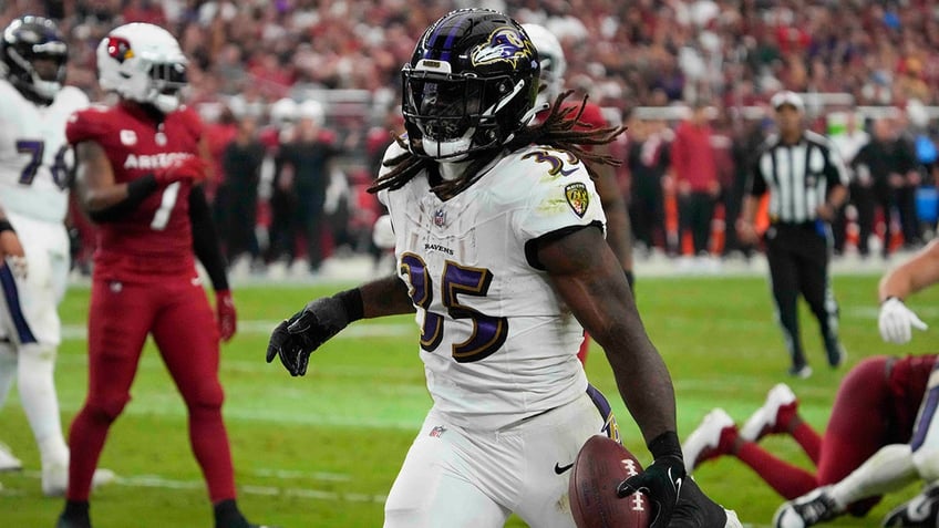 ravens win over cardinals behind gus edwards three touchdowns