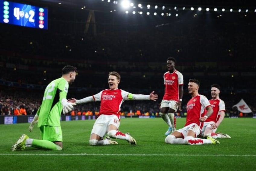 Arsenal celebrate their penalty shootout win over Porto in the Champions League last 16