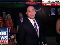 Raymond Arroyo talks to young voters in Milwaukee