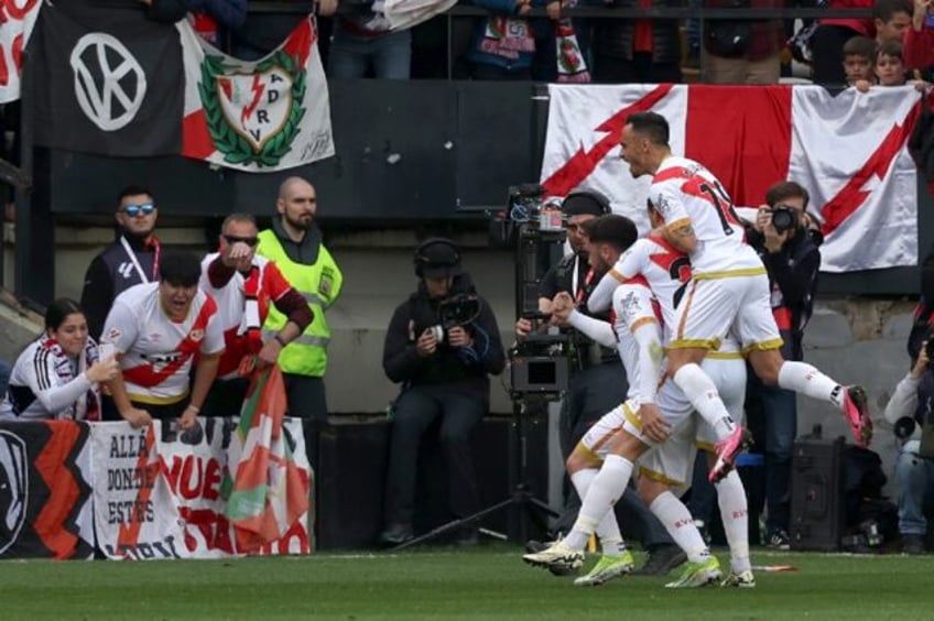 Rayo Vallecano's Spanish forward Raul de Tomas celebrates scoring his team's equaliser aga