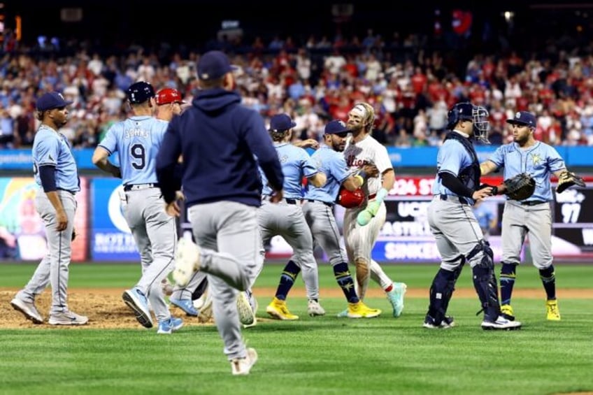 Philadelphia's Bryce Harper confronts Tampa Bay Rays players after Phillies teammate Nick