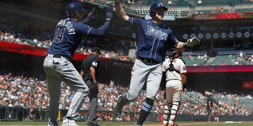 rays luke raley hits easy inside the park homer thanks to crazy double bounce