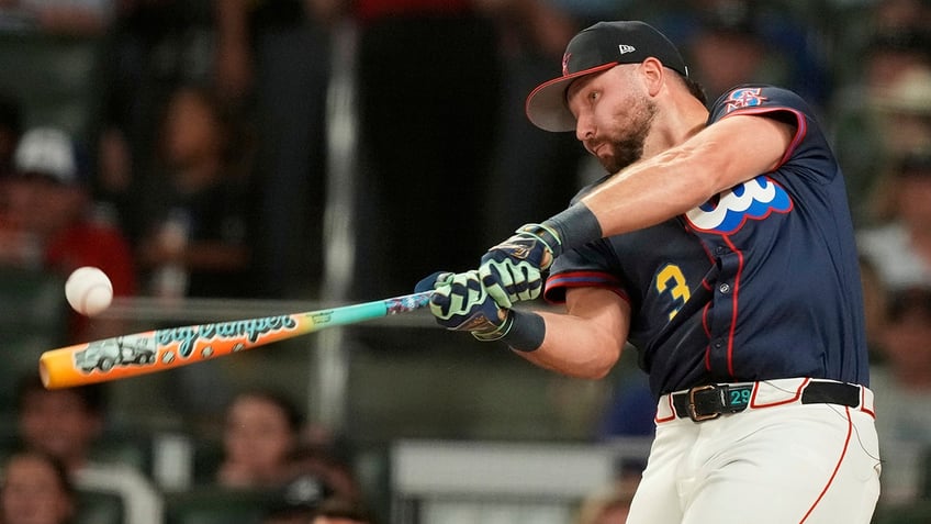 Cal Raleigh swings