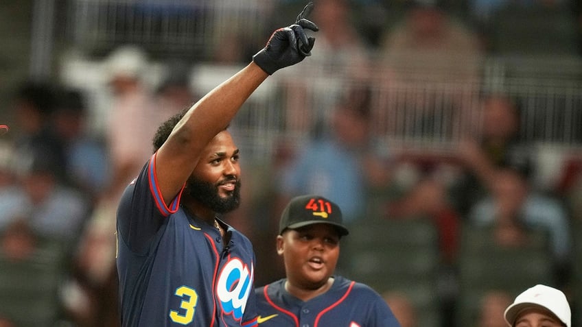 Junior Caminero celebrates