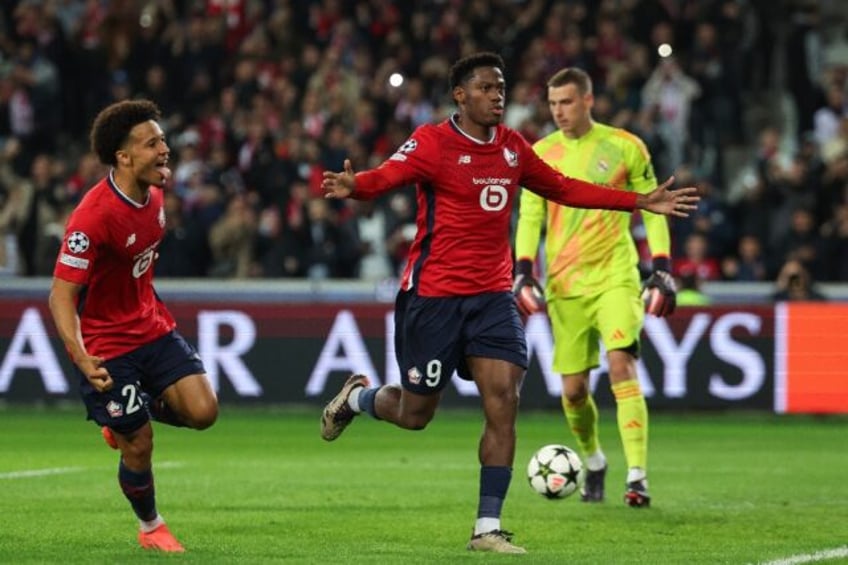 Jonathan David (C) scored a penalty as Lille recorded a famous win over Real Madrid