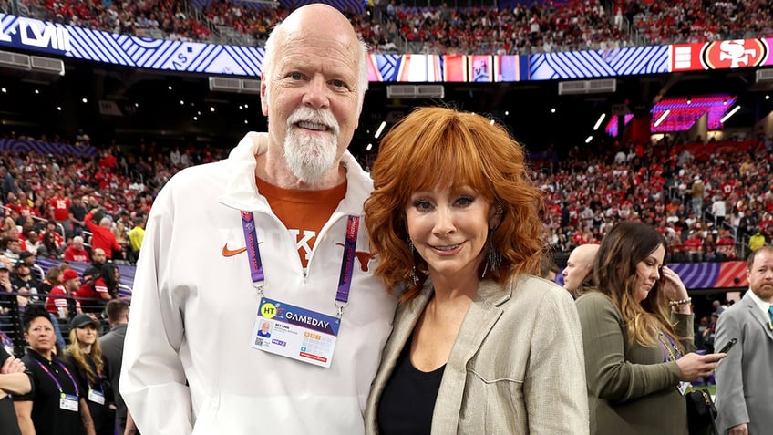 Reba McEntire and Rex Linn at the Super Bowl