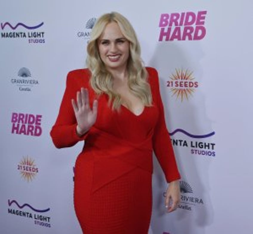 Rebel Wilson, Anna Camp step out at 'Bride Hard' premiere