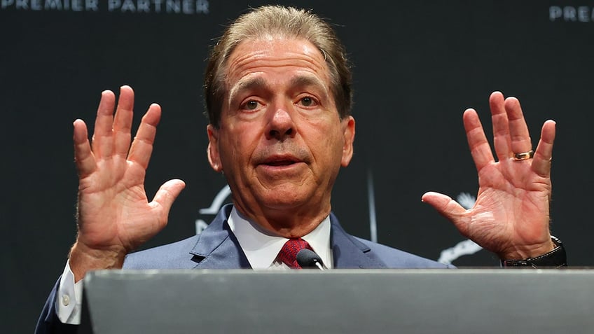 Nick Saban talks to reporters