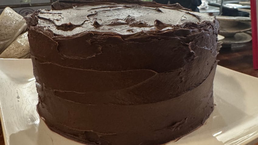 A devil's food cake sits on a table in the kitchen at Amilinda.