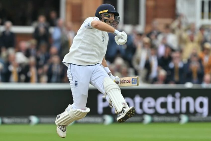 Ton of joy: England's Joe Root celebrates after reaching his second hundred of the second