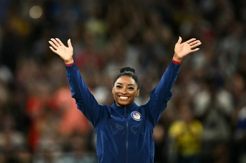 Simone Biles can win two more gold on the balance beam and floor exercise on Monday for fi