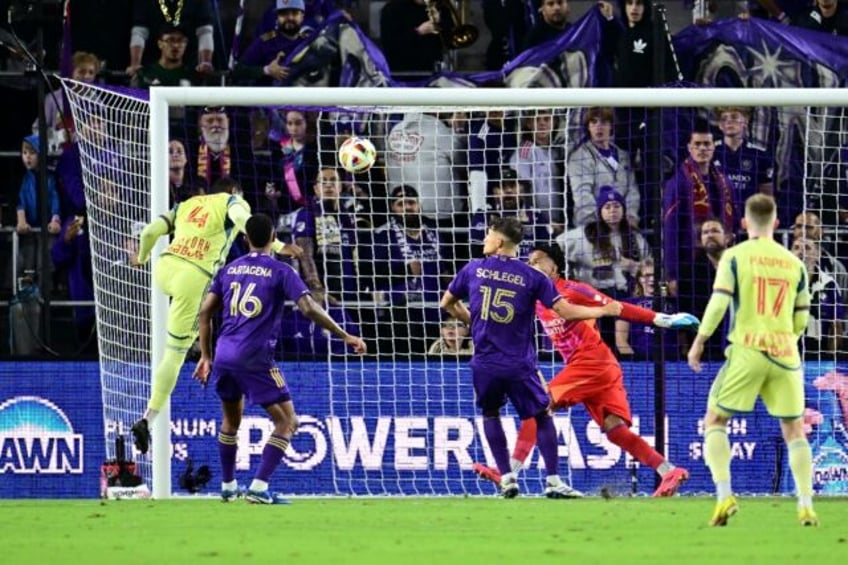 Andres Reyes heads in the winner as the New York Red Bulls beat Orlando City to reach the