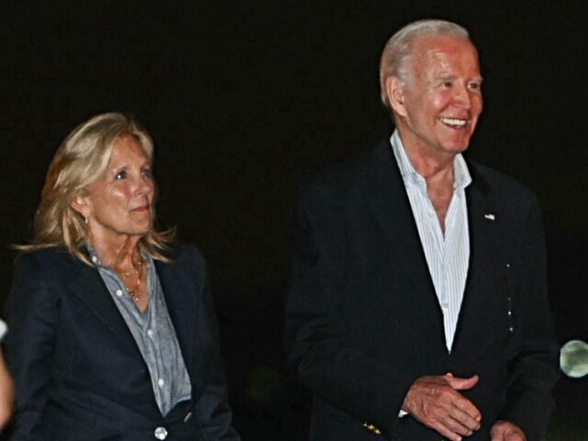 US President Joe Biden and First Lady Jill Biden greet Congresswoman Stacey Plaskett before boarding Air Force One ahead of departing Henry E. Rohlsen Airport in Christiansted, Saint Croix, on the US Virgin Islands, on January 2, 2024. The President and First Lady are returning to Washington after spending the …