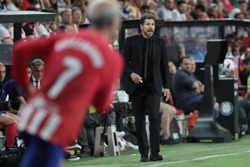 red hot atletico can confirm title credentials against struggling sevilla