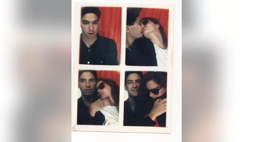 Several photos of Adam Horovitz and Ione Skye posing behind red curtains being in love.