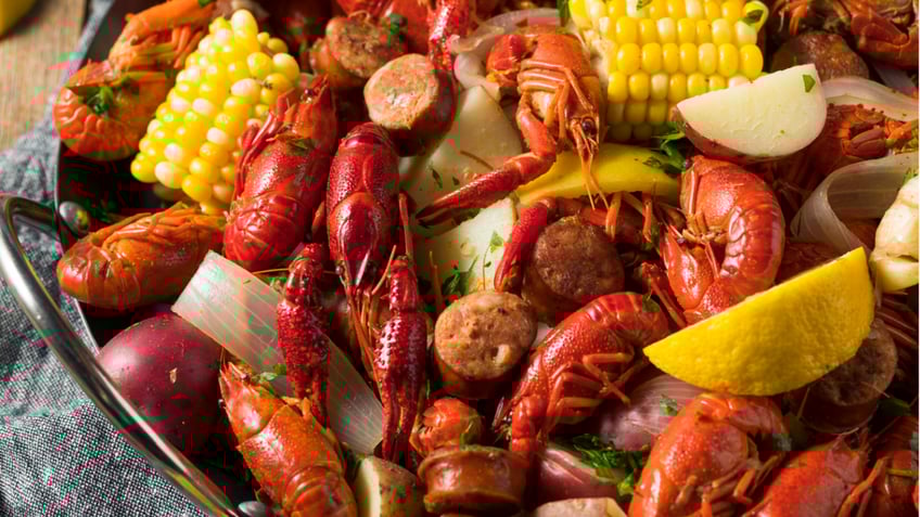 Generic stock photo of lobsters in seafood boil