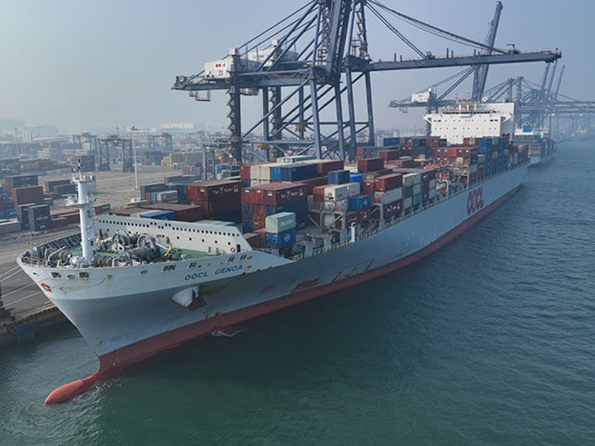 A container ship berths at a port on January 11, 2024 in Dalian, Liaoning Province of China. China's first sea cargo route from northeast China to India opened to operation on January 11, marking the opening of the first direct container ocean line in northeast China and filling the business …