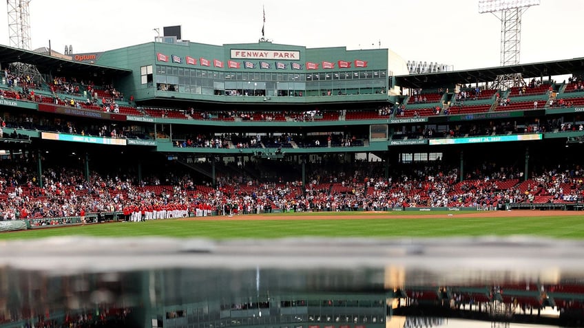 red sox fans take advantage of flooded fenway park during rain delay