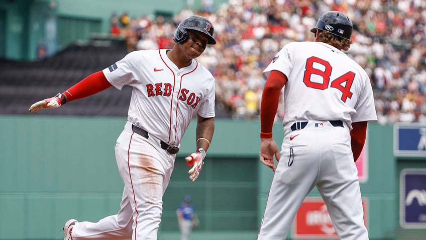 Rafael Devers rounds the bases