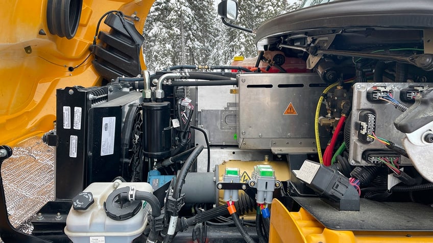 An engine compartment is visible for an electric school bus operating on Feb. 2, 2023, in Tok, Alaska.