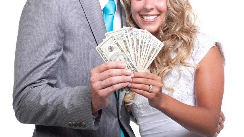 A married couple with money.