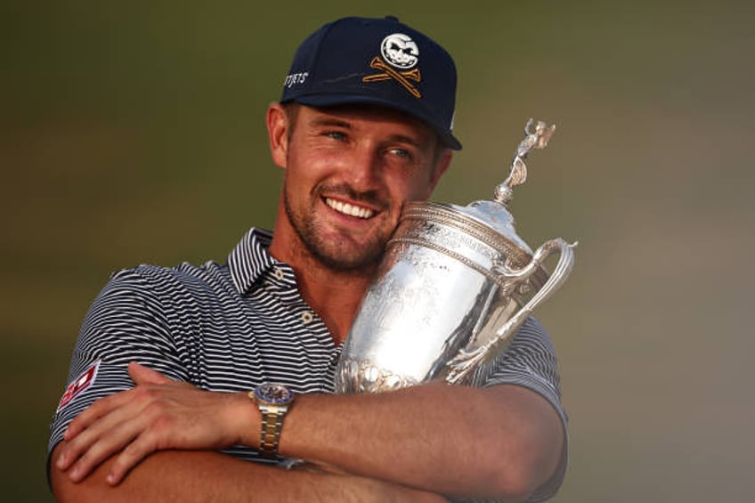 Bryson DeChambeau of the United States poses with the trophy after winning the 124th U.S. Open at Pinehurst Resort on June 16, 2024 in Pinehurst,...