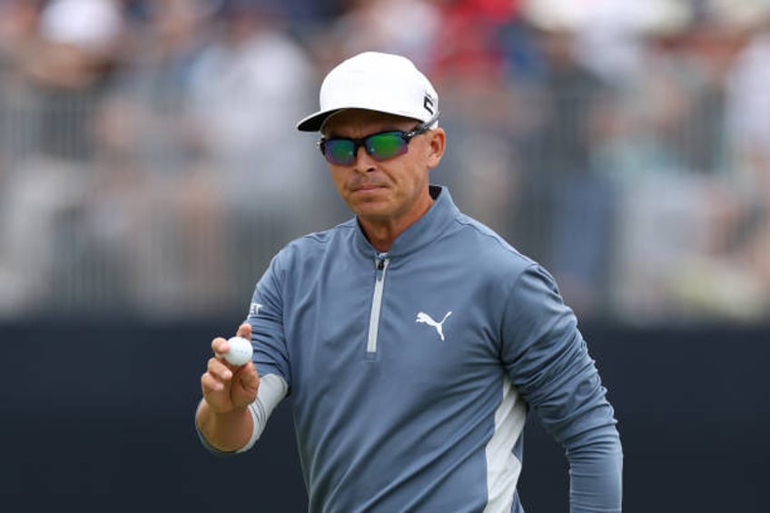 Rickie Fowler of the United States reacts to his putt on the ninth green during the first round of the 123rd U.S. Open Championship at The Los...