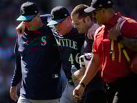 Reds’ Elly De La Cruz and Mariners reliever Trent Thornton fall ill while playing in extreme heat
