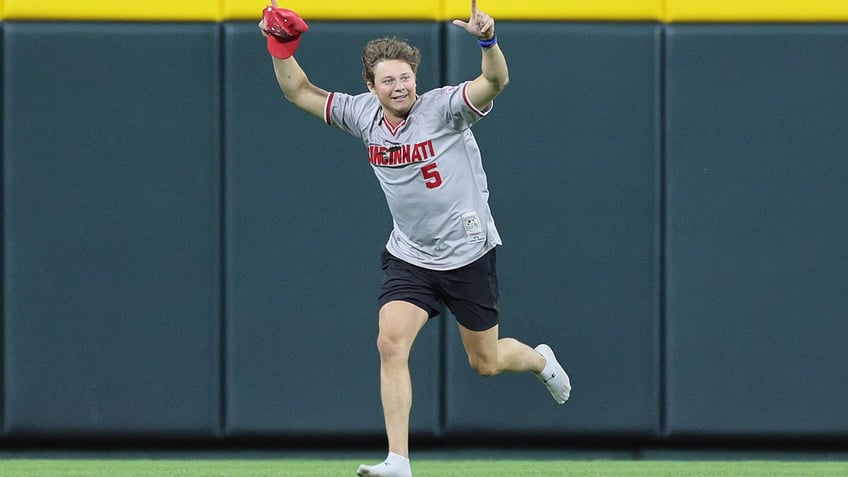 Reds fan on field