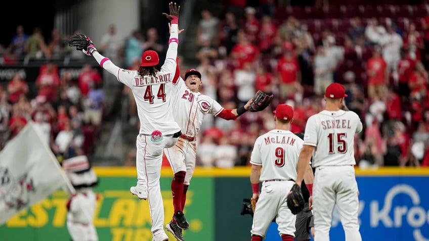 reds rookie elly de la cruz makes record breaking throw during win over giants