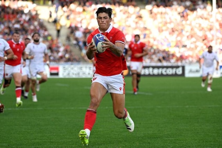 Wales wing Louis Rees-Zammit scores a try against Georgia