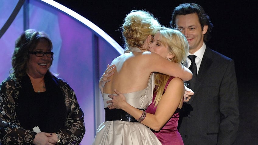 Reese Witherspoon and Kate Winslet hugging