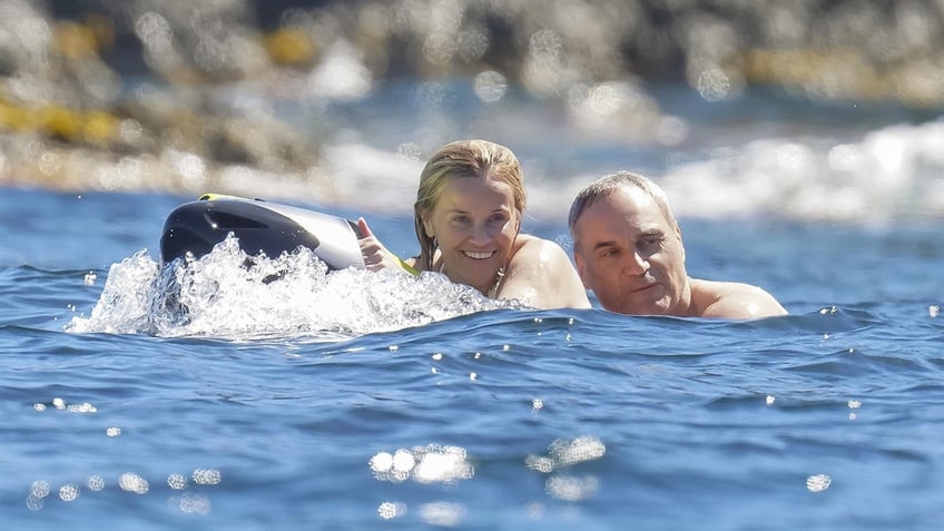 Reese Witherspoon enjoying water activities.