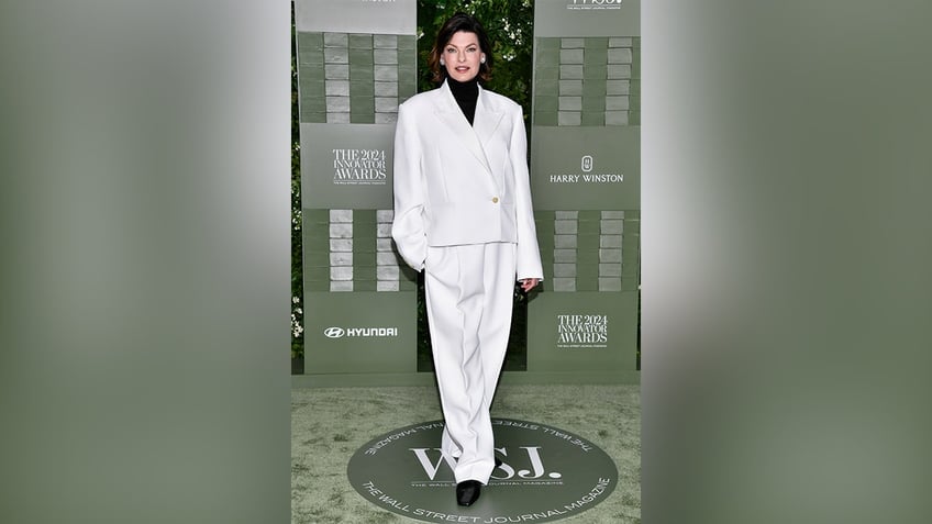 Evangelista wore a white suit to the Innovator Awards.