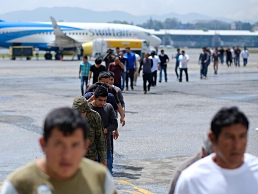 GUATEMALA CITY, GUATEMALA - AUGUST 23: Guatemalans walk off a plane during the arrival of