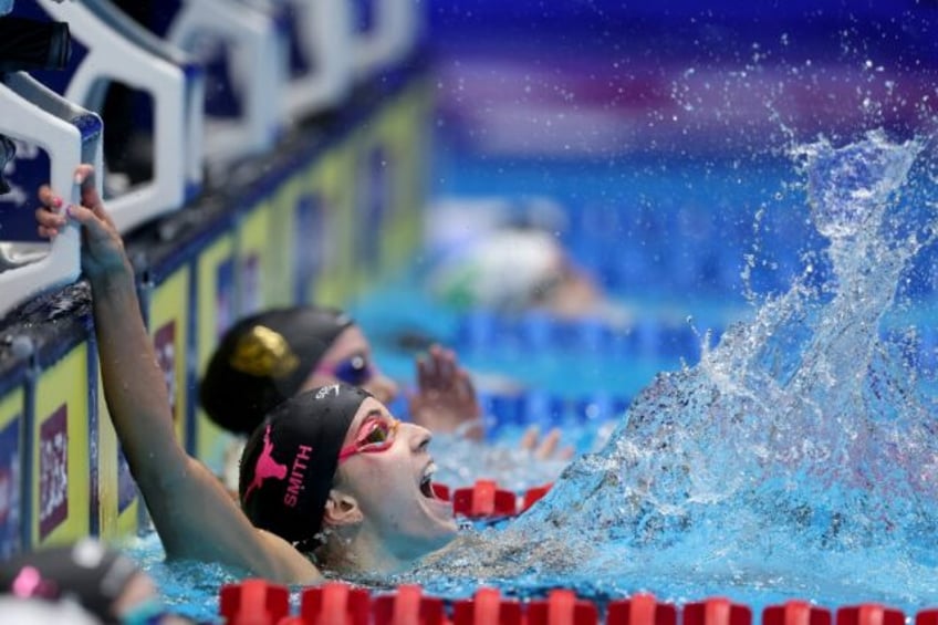 Regan Smith celebrates her world record to win the 100m backstroke at the US Olympic swimm