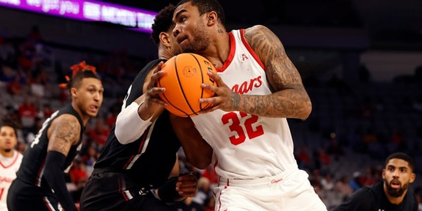 reggie chaney former college basketball player at houston and arkansas dead at 23